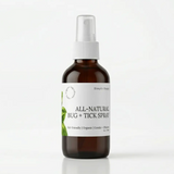 All-natural bug and tick spray bottle on a white background